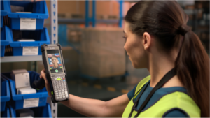 warehouse-worker-using-MC9400-zebra-mobile-computer-for-scanning